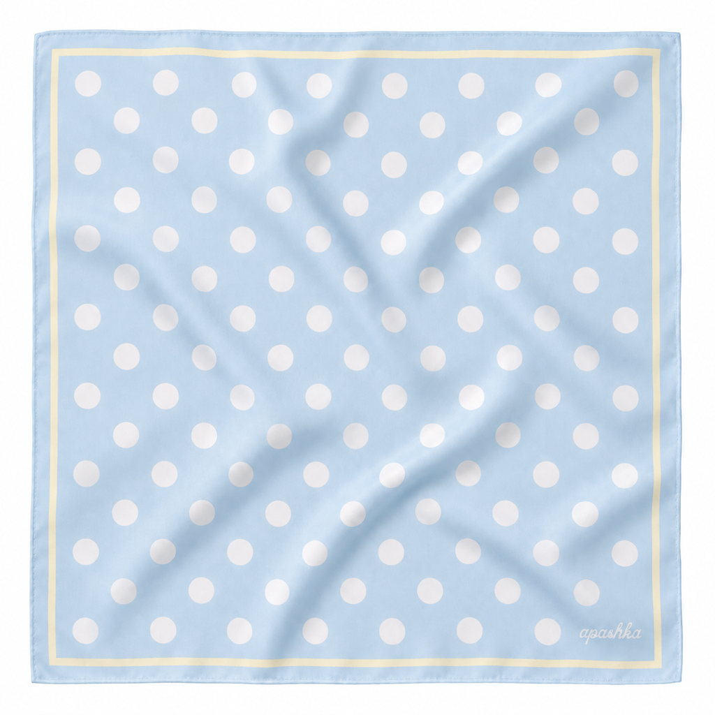 apashka Bubble-Pop Blu 100% silk twill 45x45 cm bandana featuring a light blue background with white polka dots and a pastel yellow double-border frame.